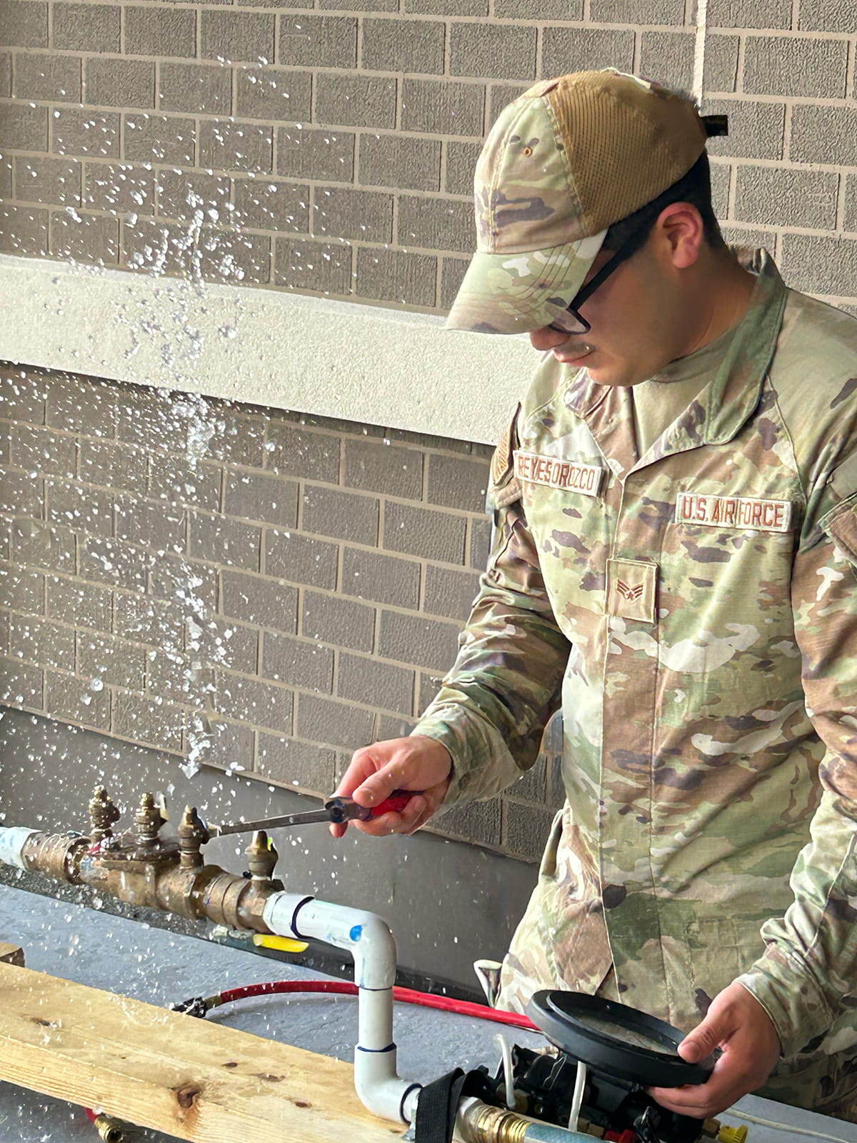 Student learning backflow certification concepts during backflow prevention training class